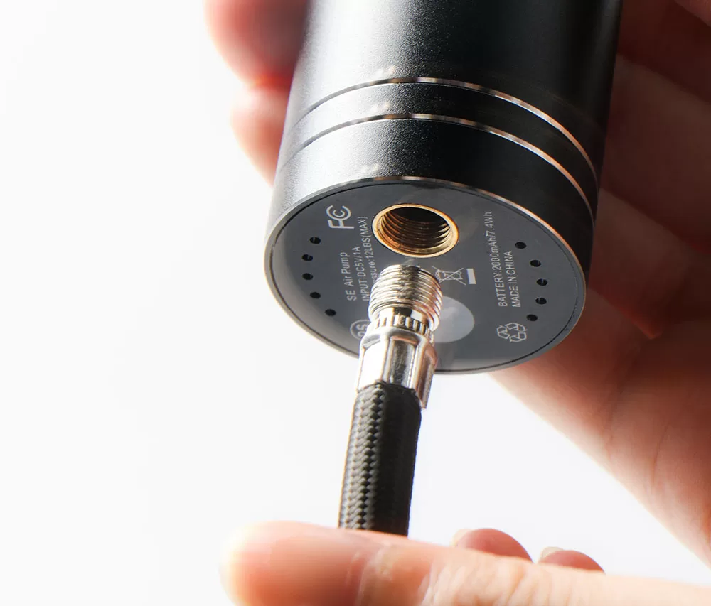Top-down view of the pump control end showing the 7–12 PSI scale and ball modes