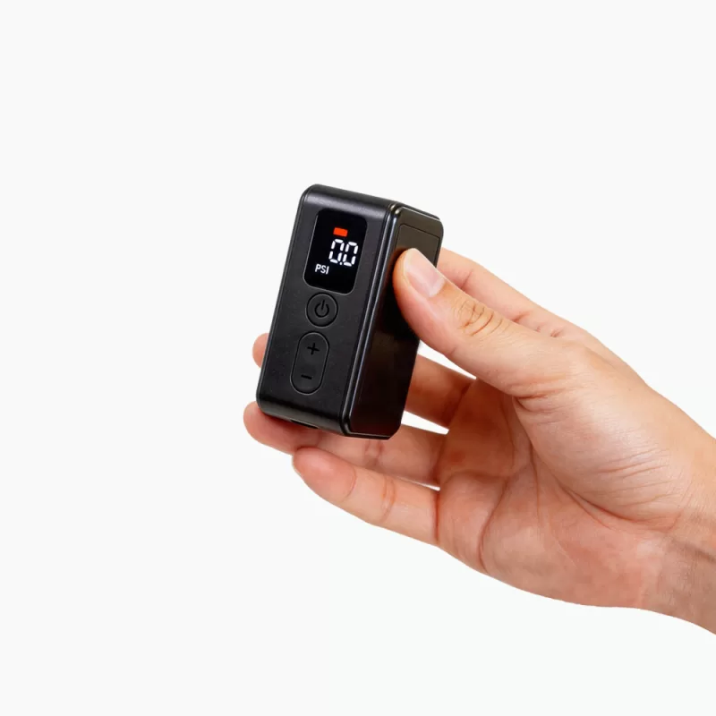 NEWO BL09 removable-battery mini electric bike pump held in one hand