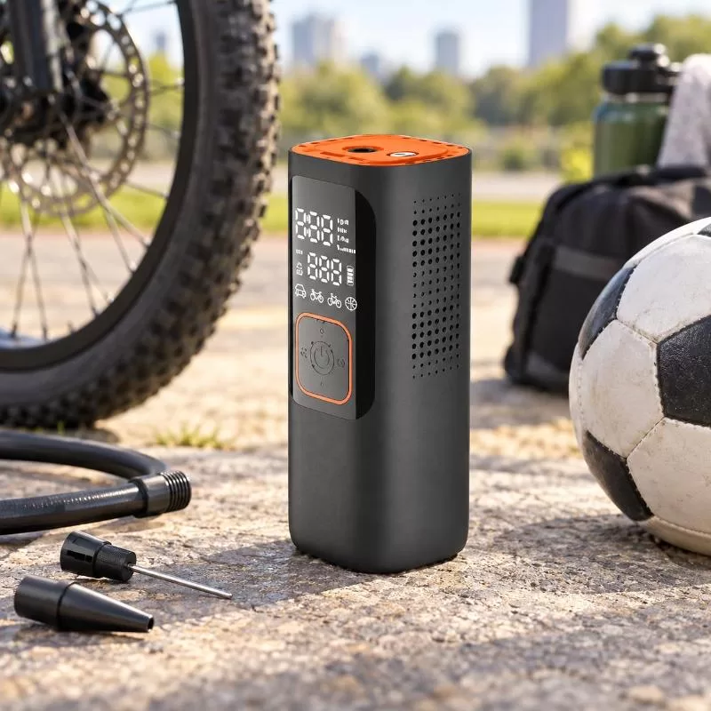 Portable electric ball pump shown from a three-quarter front angle
